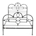 A Victorian-style black painted wrought iron double bedstead, 137 x 137 x 196cm.