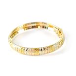 An 18ct tri-coloured gold (yellow,