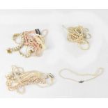 A quantity of cased and loose faux pearl necklaces to include a Boodle & Dunthorne case,