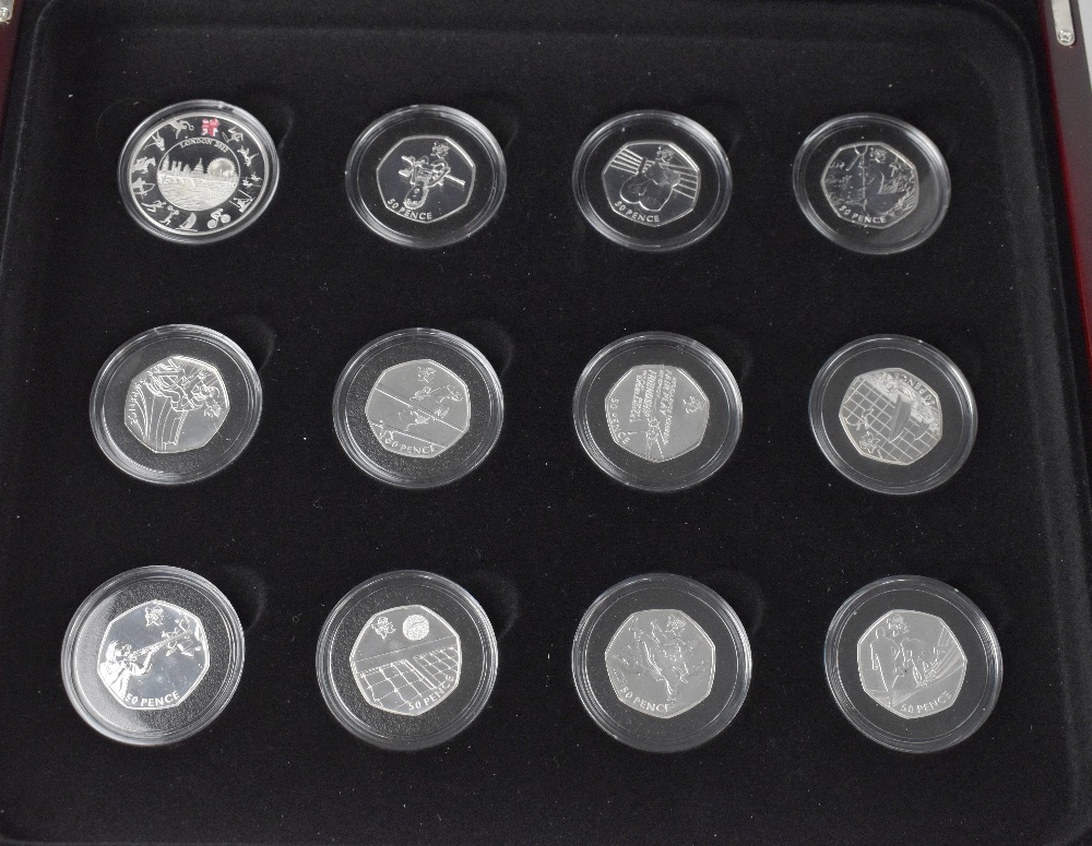 A collection of twenty-four London 2012 silver sporting 50p coins collated in two presentation - Image 4 of 4