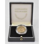 A 24ct gold Kuwait commemorative coin, approx 16.9g.