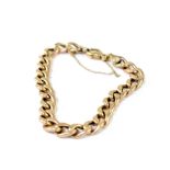 A 9ct gold belcher link bracelet with lobster claw clasp and safety chain, marked 9k, length 22cm,