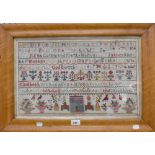 A 19th century alphabetical and floral sampler by Elizabeth Walton dated 1876, 33 x 54cm,