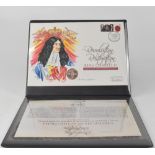 A 2010 'King Charles II Revolution to Restoration' gold £2 coin presentation cover,