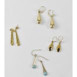 Four pairs of gold earrings to include a pair of modern 9ct French hoops with claw set garnets on