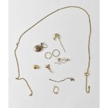 Various items of gold jewellery to include a kiwi pin, a small locket with coloured stripes,