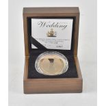 A 2011 'The Royal Wedding' (William & Catherine) £5 gold coin, limited edition no.1951/2066.