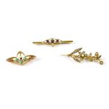 Three 19th century 9ct gold brooches to include a seed pearl flower cluster,