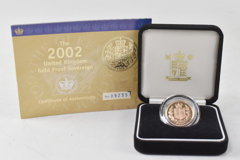 A 2002 proof sovereign, limited edition no.9235/12,500.