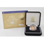 A 2002 proof sovereign, limited edition no.9235/12,500.