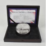 A 2015 'The Reflections of a Reign', limited edition no.028/450, 5oz, £10 silver coin.