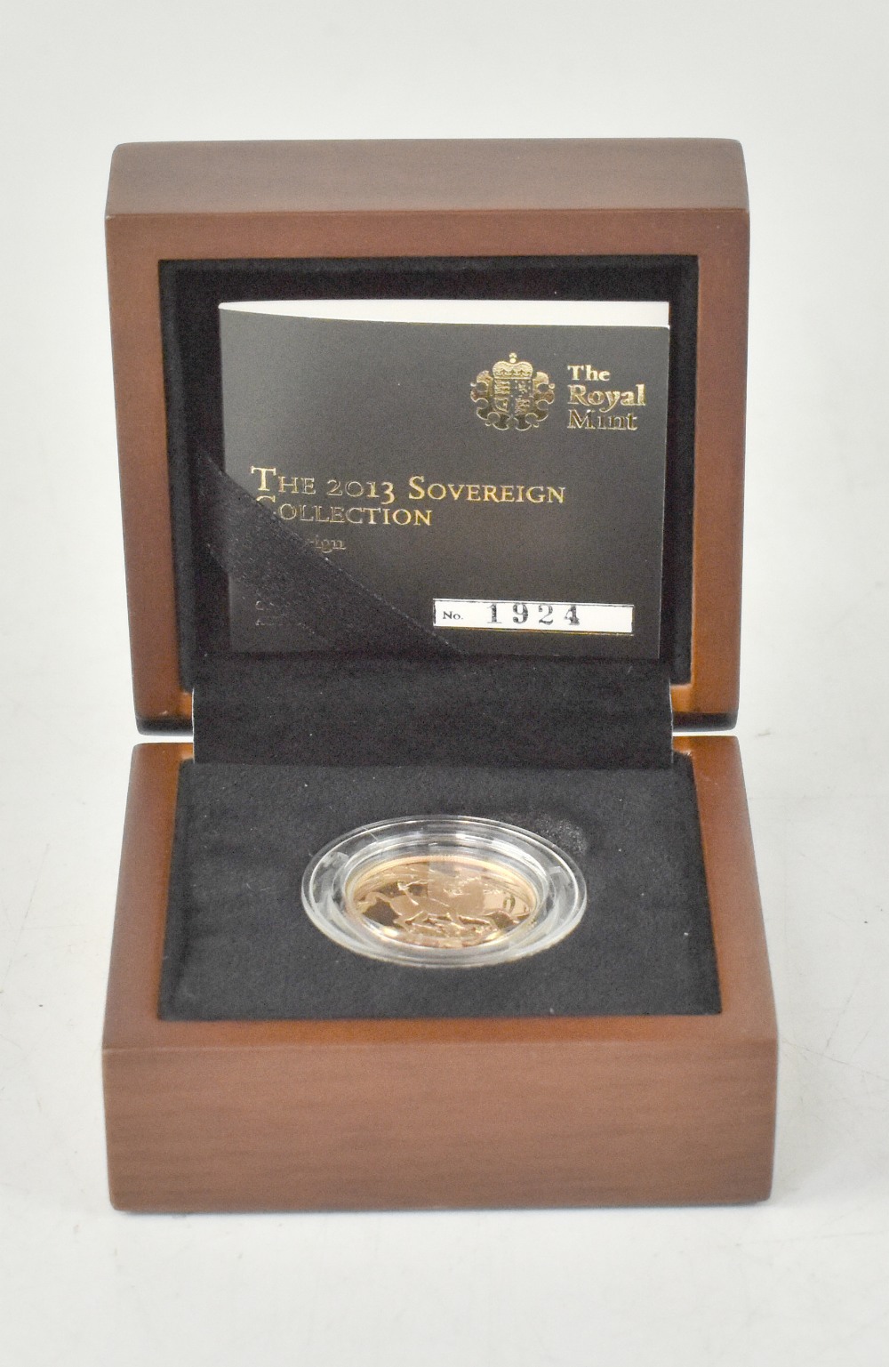 A 2013 sovereign, proof, limited edition no.1924/10,295.