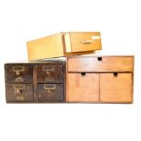 Four various small wooden storage boxes including an oak four-drawer index card box with four metal