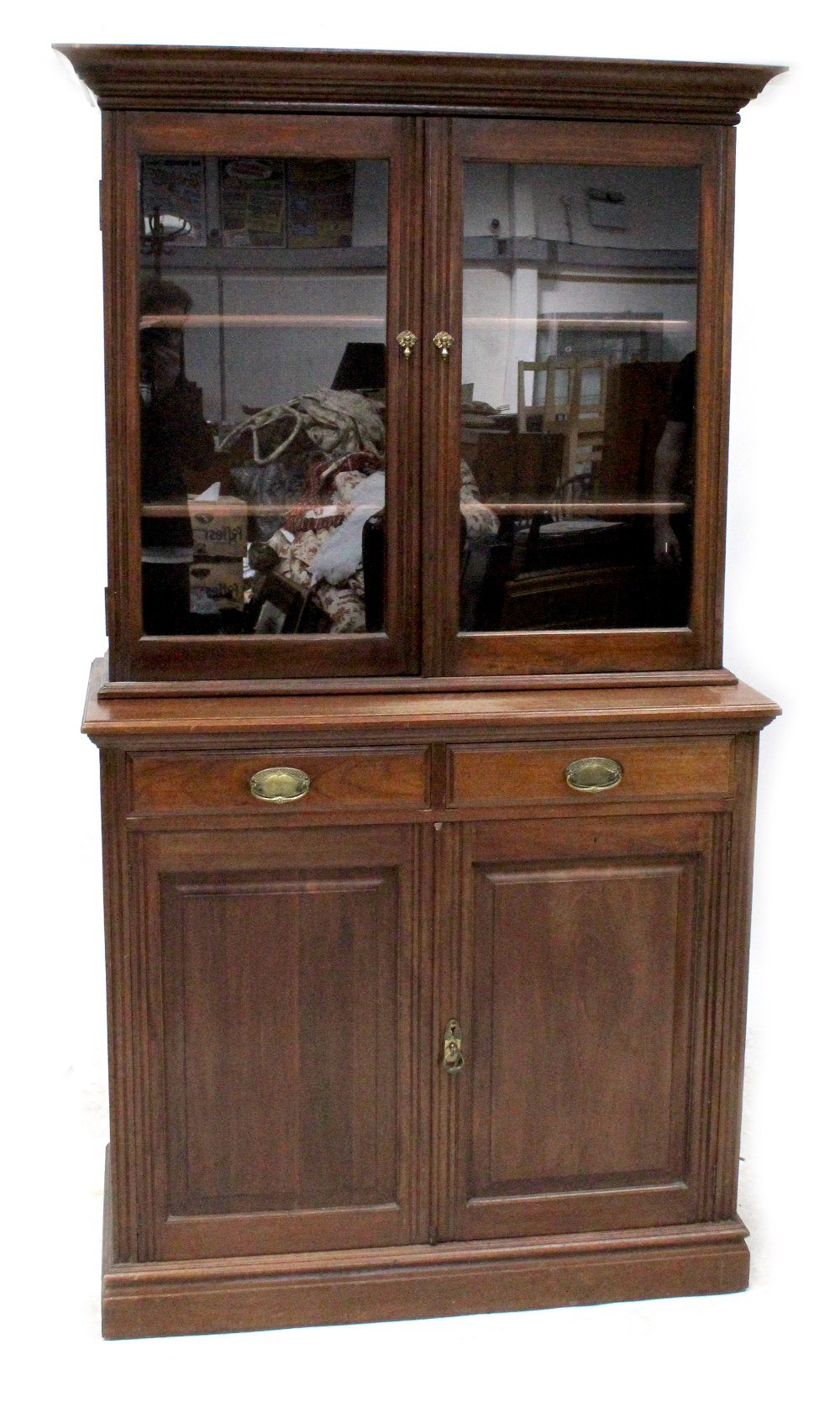 An Edwardian walnut breakfront bookcase,