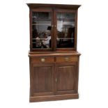 An Edwardian walnut breakfront bookcase,