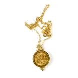 A George V 1913 half sovereign in 9ct gold fancy mount suspended on 9ct gold necklace, length 44cm,