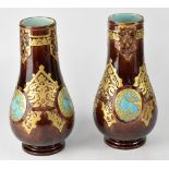 A pair of early 20th century French Sarreguemines baluster vases in the Oriental style,