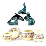 Three Poole pottery models of animals of blue and black ground,