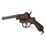 A 19th century Belgian pin fire revolver with chequered walnut grip.