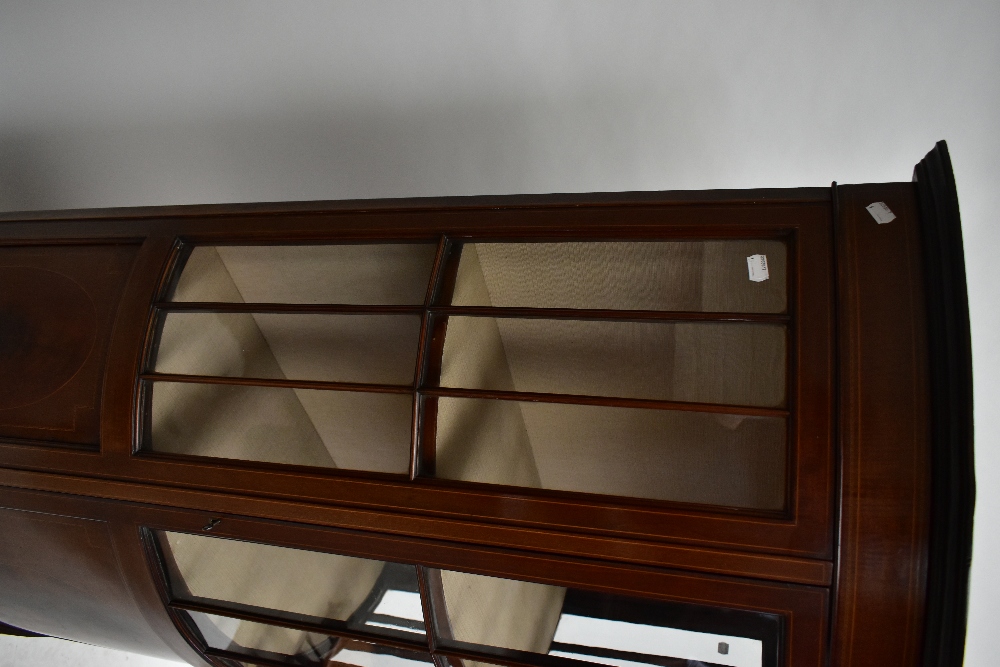 An Edwardian mahogany and boxwood inlaid bowfront display cabinet, with curved door enclosing two - Image 2 of 5