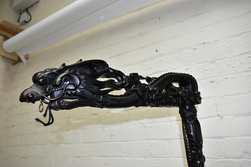 A Chinese carved rosewood standard lamp in the form of a mythical beast, height 178cm (lacking - Image 2 of 9