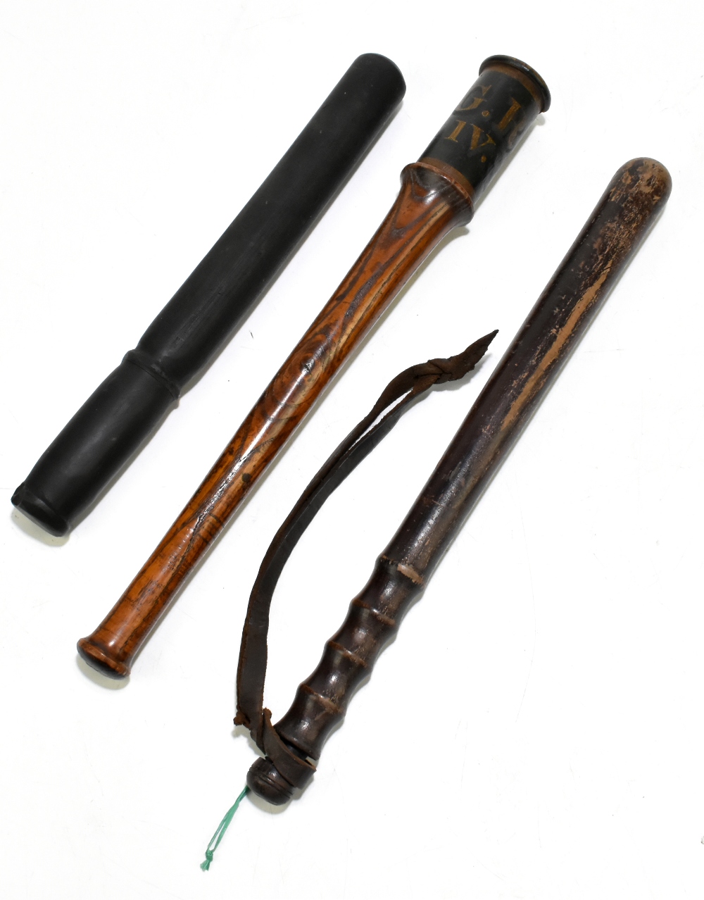 Three Police truncheons including a George IV example further inscribed 'H.N.38', length 44.5cm, a