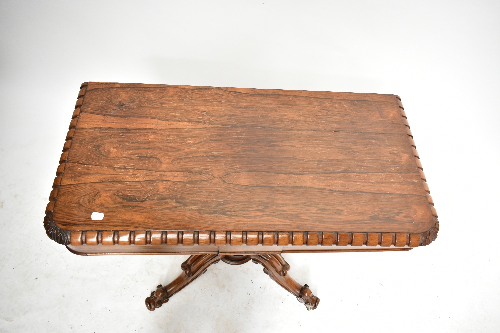 An early 19th century rosewood card table with carved detail on lobed column to four knee carved - Image 2 of 5