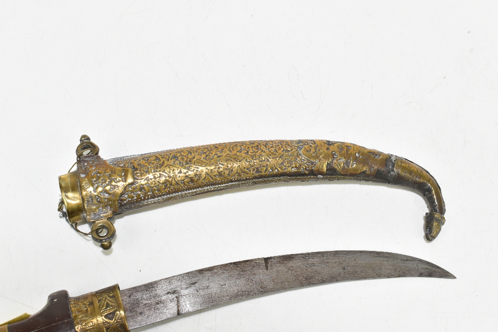 Two North East African/Middle Eastern jambiyas of typical form, both with brass scabbards, length of - Image 5 of 8