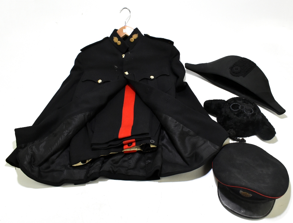 A Royal Artillery officers uniform, with label to the interior ‘Lt. J.A. Shaw, together with a Royal