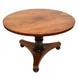 GILLOWS OF LANCASTER; a 19th century rosewood tilt-top breakfast table, the circular top raised on