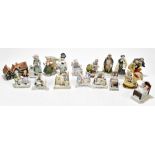 A collection of ten ceramic fairings including two figural spill vases, 'I am off with him', and '