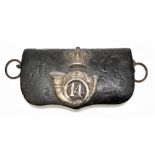 A 19th century leather ammunition pouch with applied white metal crown and badge for the 14th