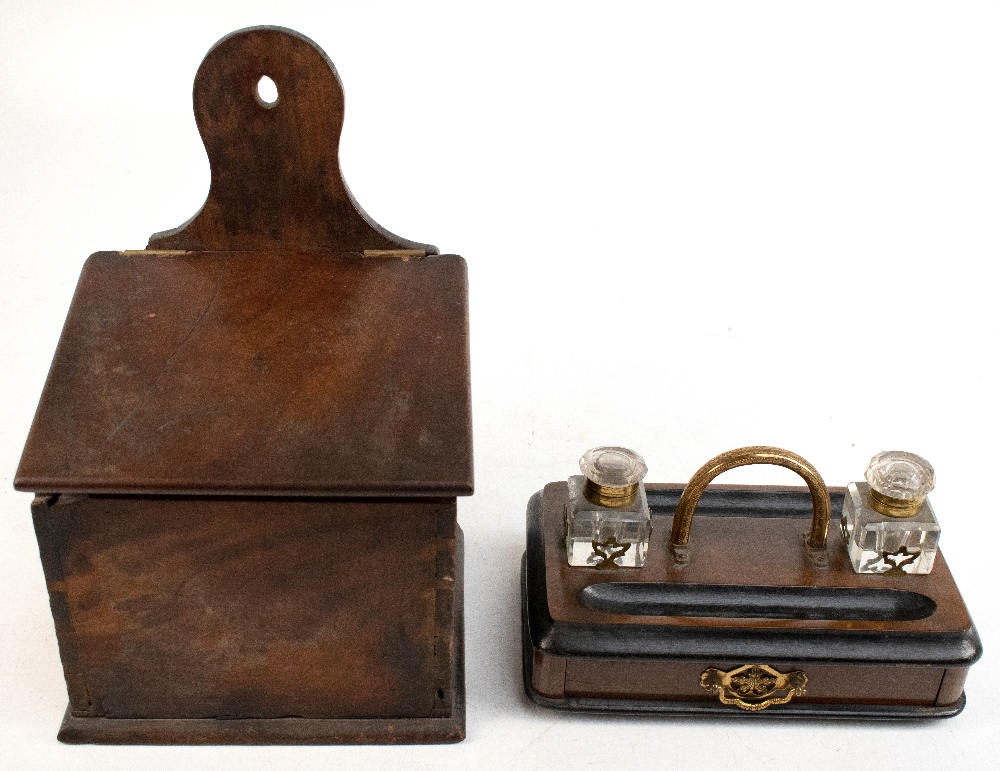 An early 19th century mahogany salt box, height 36cm, and an early 20th century walnut desk stand,