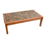 THICH; a mid-20th century Danish teak coffee table, of rectangular form inset with eighteen