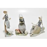 LLADRO; three boxed figures to include a duck seller, etc (3).Additional InformationEach of the