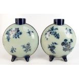 A near pair of 19th century flow blue moon flasks in the manner of Royal Doulton, height 35.5cm (