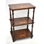 A Victorian inlaid walnut three tier watnot, with turned column supports, on later castors lacking