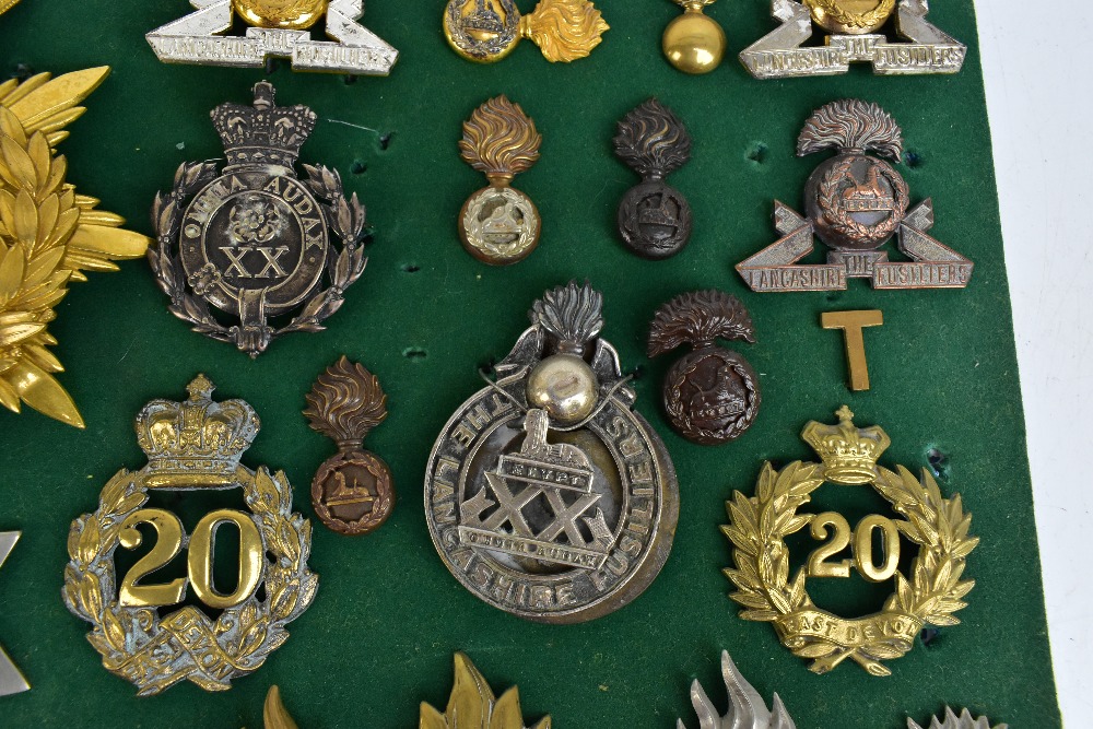 THE LANCASHIRE FUSILIERS; a good group of badges including a gilt helmet/shako plate for the 20th of - Image 9 of 10