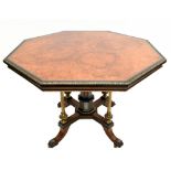 A fine 19th century amboyna, ebony and inlaid octagonal centre table with gilt brass mounts, the