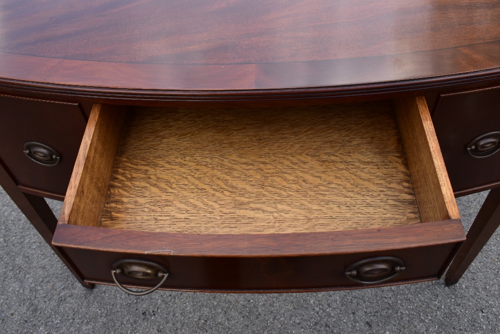 A reproduction mahogany veneered George III style side table, with three oak lined drawers, raised - Image 3 of 4
