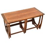 A G-plan teak nest of three coffee tables on shaped end supports, largest table height 51cm, width