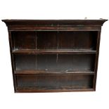 A 19th century oak hanging plate rack, with moulded cornice above two fixed shelves, length 102cm,