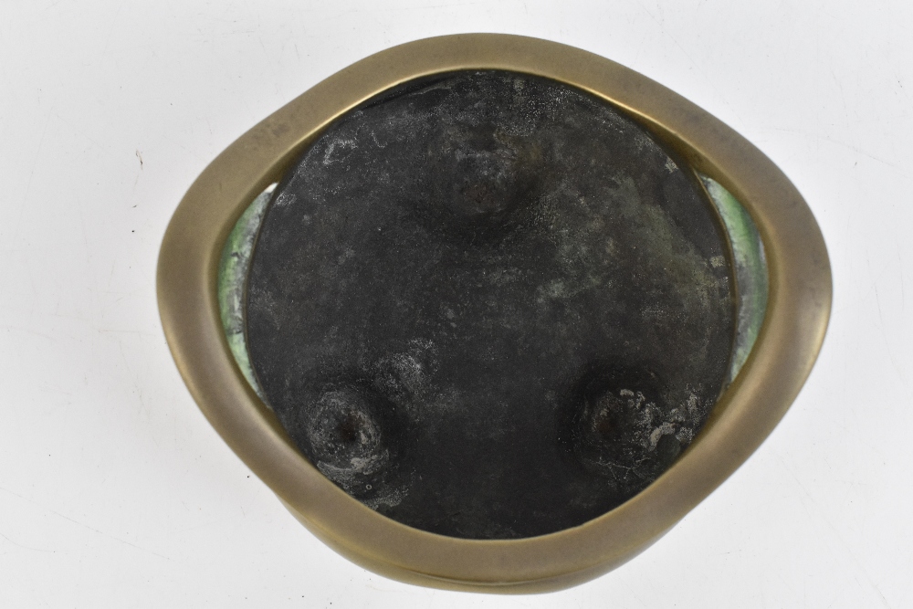 A Chinese bronze censer with pierced twin raised handles and three simple tapering supports, - Image 7 of 7