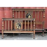 An early 20th century oak framed bedstead, with blind fret and chinoiserie decoration, length of