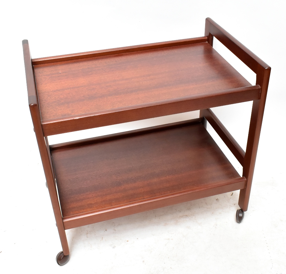 BRDR FURBO; a Danish teak two tier trolley, raised on block supports, height 63cm, length 68cm.