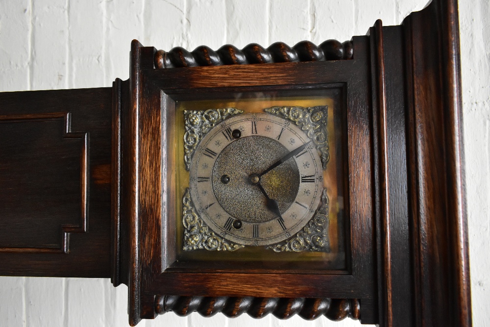 An early 20th century oak cased longcase clock of small proportions, the brass face with applied - Image 2 of 5