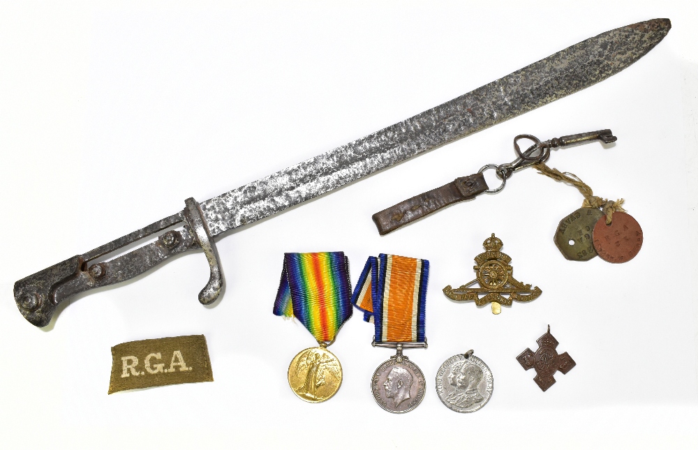 A WWI War and Victory medal duo, awarded to 157283 Gunner W. Swaby R.A., accompanying dog tags,