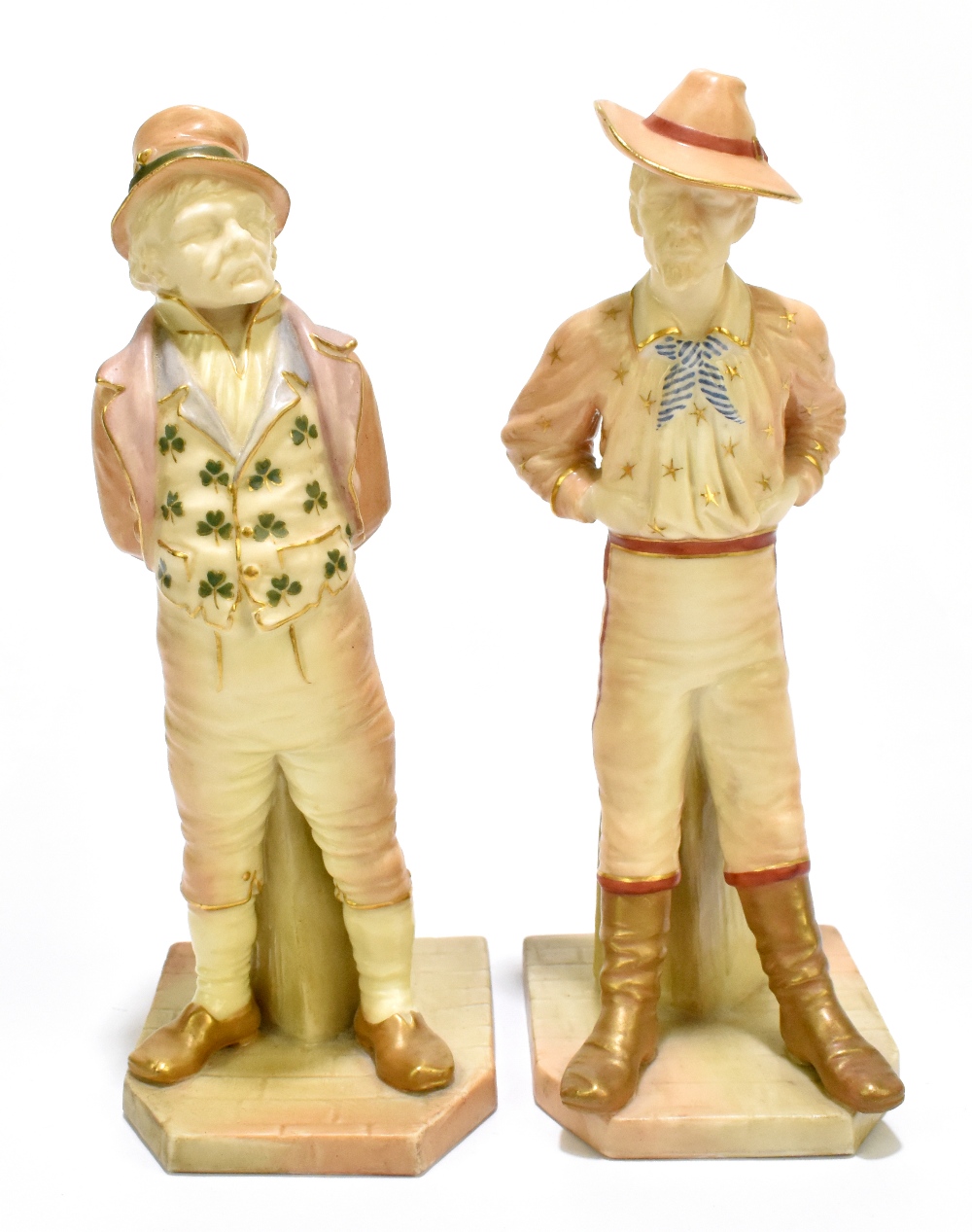 ROYAL WORCESTER; two blush ivory figures emblematic of countries, modelled by James Hadley