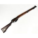 LEE ENFIELD; a .303 bolt action fully stocked rifle manufactured by B.S.A. Co, the breech stamped '