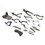 A group of antique steel and iron spurs and rowel spurs, some bearing decoration, a circa 12-14th